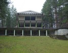 Hotel next to an old pine forest