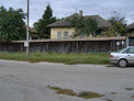 Rural house with a garden, a summer kitchen with bathroom and two-storey outbuilding  