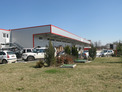 Refrigerated warehouse, office building, car service with built communications  